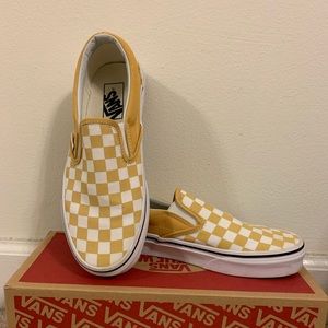 size 8 yellow/golden slip on checkered vans. worn a solid one time lol